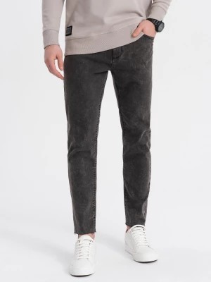 Zdjęcie produktu Męskie jeansowe spodnie marmurkowe z surowo wykończoną nogawką SLIM FIT - czarne V3 OM-PADP-0146
 -                                    XL