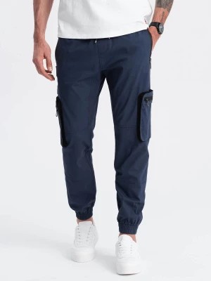 Zdjęcie produktu Męskie spodnie JOGGERY z zapinanymi kieszeniami cargo - granatowe V5 OM-PAJO-0135
 -                                    XXL