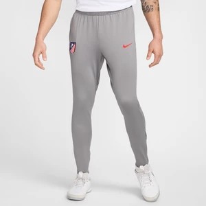 Zdjęcie produktu Męskie spodnie piłkarskie Atlético Madryt Strike Nike Dri-FIT - Szary