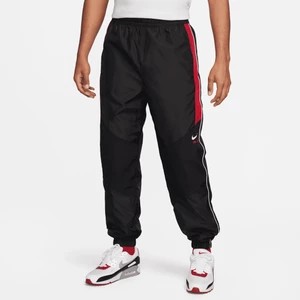 Zdjęcie produktu Męskie spodnie z tkaniny Nike Air - Czerń