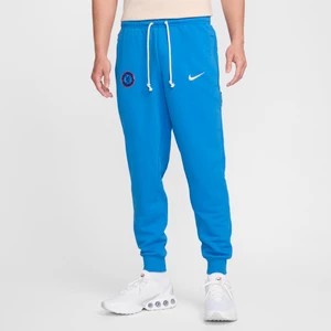 Zdjęcie produktu Męskie zwężane spodnie piłkarskie Nike Dri-FIT Chelsea F.C. Standard Issue - Niebieski