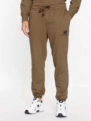 Zdjęcie produktu New Balance Spodnie dresowe Essentials Stacked Logo French Terry Sweatpant MP31539 Brązowy Regular Fit