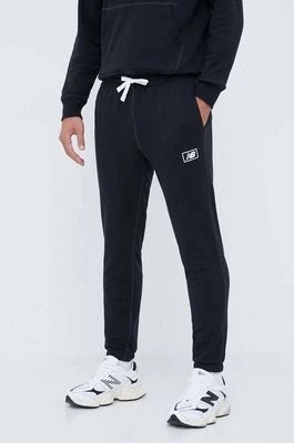 Zdjęcie produktu New Balance spodnie dresowe kolor czarny gładkie