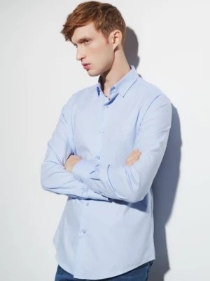 Zdjęcie produktu Niebieska koszula męska slim OCHNIK