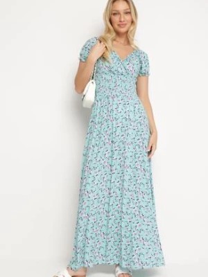 Zdjęcie produktu Niebieska Sukienka z Wiskozy z Kopertowym Dekoltem i Gumką w Pasie w Kwiaty Kaseri
