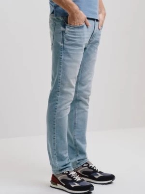 Zdjęcie produktu Niebieskie spodnie jeansowe męskie OCHNIK