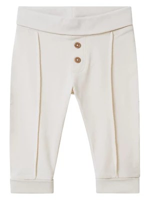 Zdjęcie produktu Noppies Spodnie dresowe "Taneytown" w kolorze kremowym rozmiar: 62