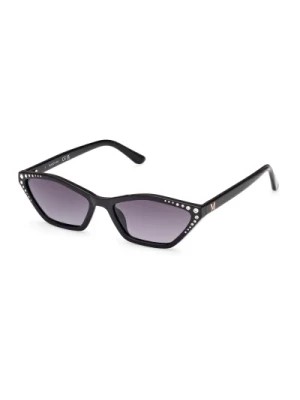 Zdjęcie produktu Podnieś swój styl tymi okularami przeciwsłonecznymi dla kobiet Guess