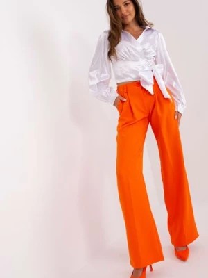 Zdjęcie produktu Pomarańczowe garniturowe spodnie z kieszeniami Lakerta