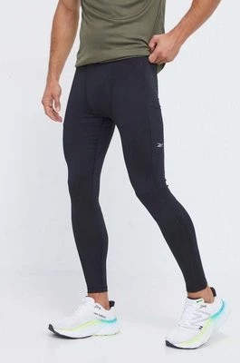 Zdjęcie produktu Reebok legginsy funkcyjne Run Base Layer kolor czarny gładkie