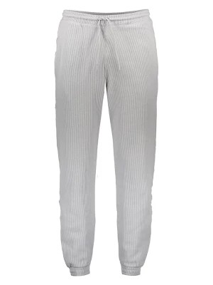 Zdjęcie produktu Reebok Spodnie dresowe "Vector" w kolorze szarym rozmiar: XL