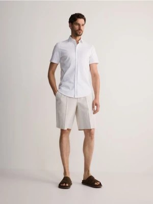 Zdjęcie produktu Reserved - Gładka koszula slim fit - biały