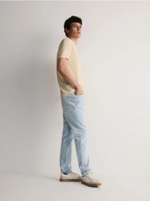 Zdjęcie produktu Reserved - Jeansy slim fit z przetarciami - niebieski