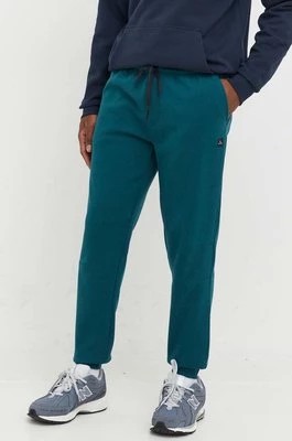 Zdjęcie produktu Rip Curl spodnie dresowe męskie kolor zielony gładkie