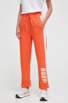 Zdjęcie produktu Roxy spodnie dresowe bawełniane kolor pomarańczowy z nadrukiem