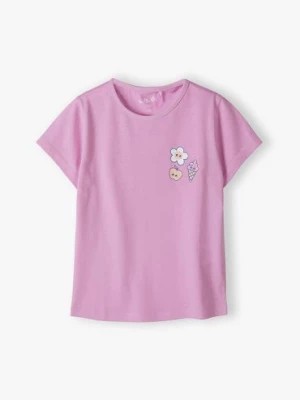 Zdjęcie produktu Różowy t-shirt dziewczęcy z kwiatkiem - 5.10.15.