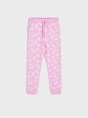 Zdjęcie produktu Sinsay - Spodnie dresowe jogger Barbie - różowy
