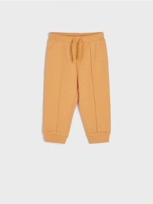 Zdjęcie produktu Sinsay - Spodnie dresowe jogger - pomarańczowy