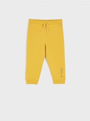 Zdjęcie produktu Sinsay - Spodnie dresowe jogger - żółty