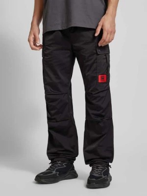 Zdjęcie produktu Spodnie cargo z prostą nogawką i naszywką z logo model ‘Guno’ HUGO