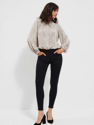 Zdjęcie produktu Spodnie damskie jeansy z dżetami - czarne Moodo