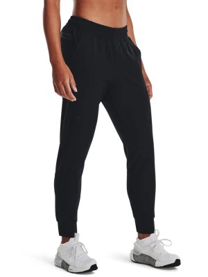 Zdjęcie produktu Spodnie dresowe damskie Under Armour UA Unstoppable Jogger - czarne