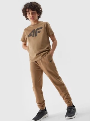 Zdjęcie produktu Spodnie dresowe joggery chłopięce - beżowe 4F JUNIOR