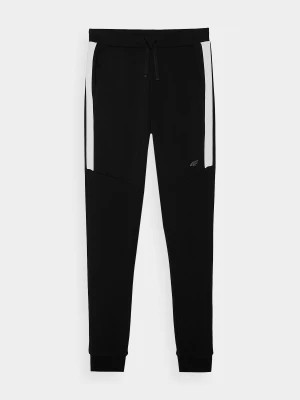 Zdjęcie produktu Spodnie dresowe joggery chłopięce - czarne 4F JUNIOR
