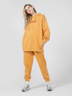 Zdjęcie produktu Spodnie dresowe joggery damskie Outhorn - żółte
