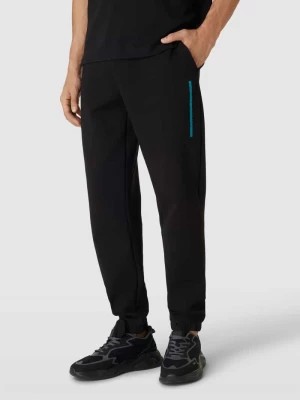 Zdjęcie produktu Spodnie dresowe o kroju comfort fit w jednolitym kolorze CK Calvin Klein