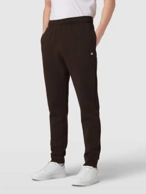 Zdjęcie produktu Spodnie dresowe o kroju regular fit z elastycznym pasem Champion