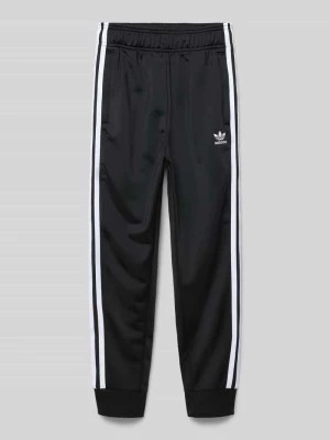 Zdjęcie produktu Spodnie dresowe o kroju regular fit z wyhaftowanym logo adidas Originals