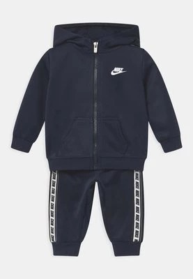 Zdjęcie produktu Spodnie materiałowe Nike Sportswear