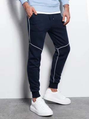 Zdjęcie produktu Spodnie męskie dresowe joggery z kontrastowymi elementami - granatowe V3 OM-PASK-22FW-001
 -                                    L