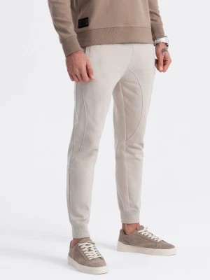 Zdjęcie produktu Spodnie męskie dresowe typu jogger - jasnobeżowe V1 OM-PABS-0173
 -                                    XL