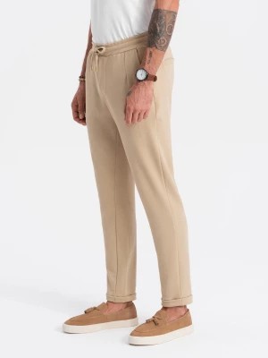 Zdjęcie produktu Spodnie męskie dzianinowe z gumką w pasie - piaskowe V3 OM-PACP-0121
 -                                    XL