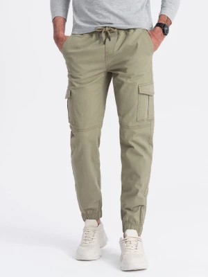 Zdjęcie produktu Spodnie męskie JOGGERY z zapinanymi kieszeniami cargo - khaki V1 OM-PAJO-0123
 -                                    M