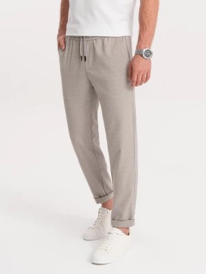 Zdjęcie produktu Spodnie męskie w kratkę z gumką w pasie - jasnoszare V1 OM-PACP-0122
 -                                    XL