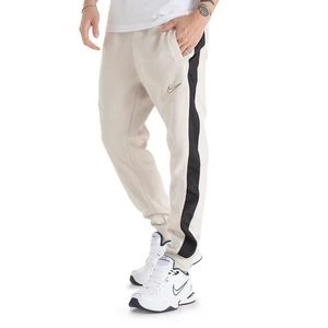 Zdjęcie produktu Spodnie Nike Sportswear Fleece FN0246-104 - beżowe