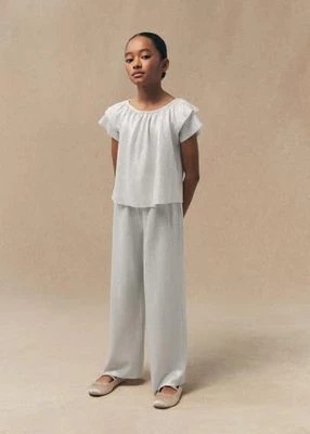 Zdjęcie produktu Spodnie o prostym kroju w metalicznym kolorze Mango Kids