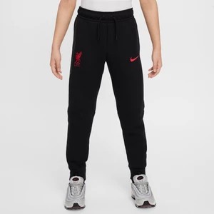 Zdjęcie produktu Spodnie piłkarskie dla dużych dzieci (chłopców) Nike Liverpool F.C. Tech Fleece - Czerń
