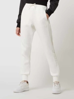 Zdjęcie produktu Spodnie sportowe ze scuby Guess Activewear