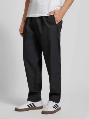Zdjęcie produktu Spodnie z detalem z logo Tommy Jeans