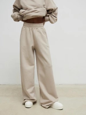 Zdjęcie produktu Spodnie z szerokimi nogawkami w kolorze BEIGE TONE - MEMPHIS-XS Marsala