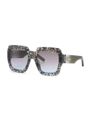 Zdjęcie produktu Stylowe okulary przeciwsłoneczne z brązowym gradientem niebieskim Chopard