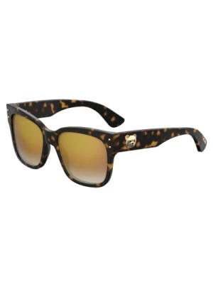 Zdjęcie produktu Stylowe okulary przeciwsłoneczne z gradientową złotą soczewką Moschino