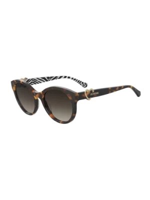 Zdjęcie produktu Stylowe okulary przeciwsłoneczne z przyciemnionymi szkłami Moschino