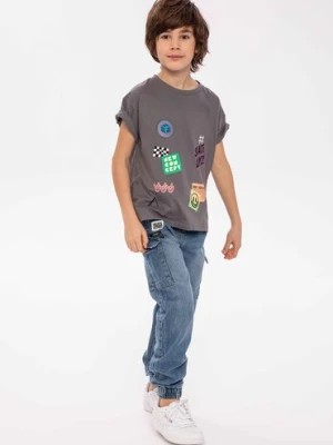 Zdjęcie produktu Szary t-shirt bawełniany dla chłopca z nadrukiem Minoti