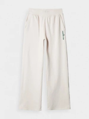 Zdjęcie produktu Szerokie spodnie dresowe damskie - kremowe OUTHORN