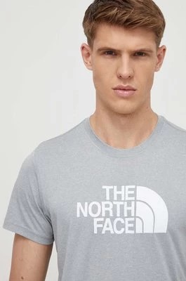 Zdjęcie produktu The North Face t-shirt sportowy Reaxion Easy kolor szary z nadrukiem NF0A4CDVX8A1